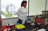 Elizabeth Rahr (RA) of Sakuma Realty with Christmas decorations and jewelry at last year's Abe Lee Realty Craft & Bake Sale.