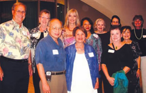 Realtors For Opera Group At Blaisdell Center Concert Hall. From left (front row), Wendell M. K.Wong, Aloha Pacific Properties; Anne Keamo, Properties Unlimited; Elarka Yuen, Gentry Homes; (back row) Robert Vieira, Prudential Locations; Judy Kalbrener, Altera Real Estate; Margo Brower, Captain Cook & Associates; Cyndie Smith, Gentry Homes; Christine O'Brien, Coldwell Banker Pacific Properties; Frankie Anderson, Coldwell Banker Pacific Properties; Judy Sykes, Sykes & Sykes Properties; Maggie Walker, Coldwell Banker Pacific Properties.