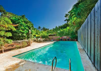 Swimming pool and gardens at Puu Panini house.