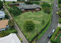 Residence of the late Dr. Masato Mitsuda occupies 3/4 acre lot with frontage on Keeaumoku Street