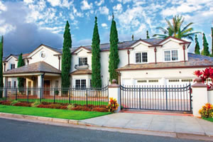 Landscaped property includes stately Italian Cypress trees